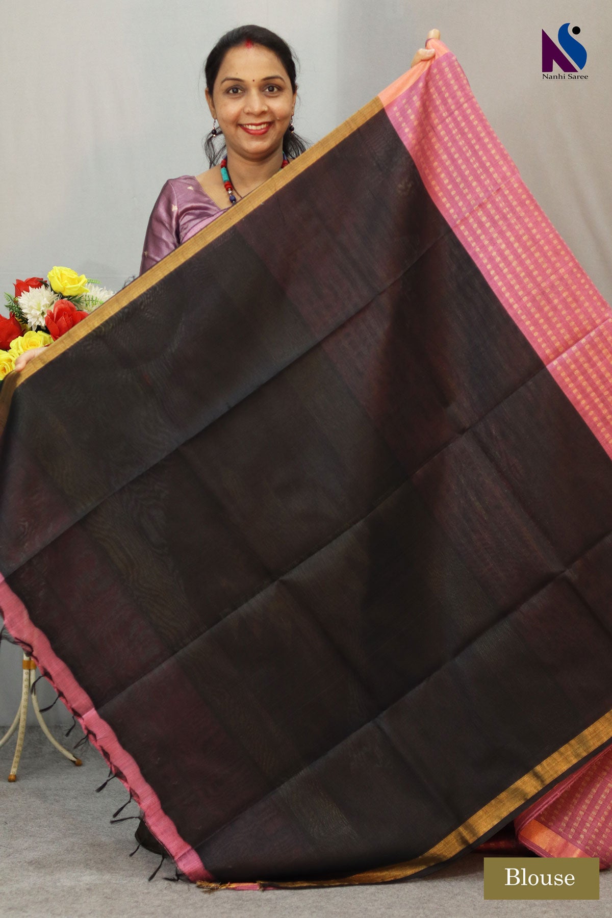 A charming English pink handloom creation designed for effortless elegance