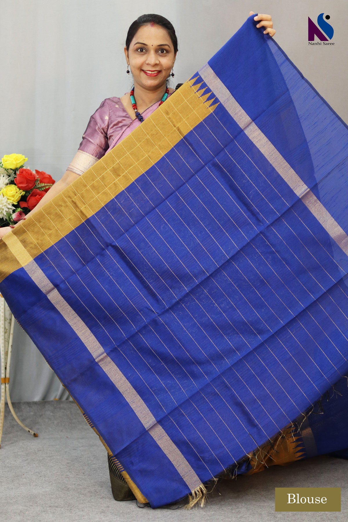 Regal golden and blue tones paired with exquisite handloom craftsmanship saree