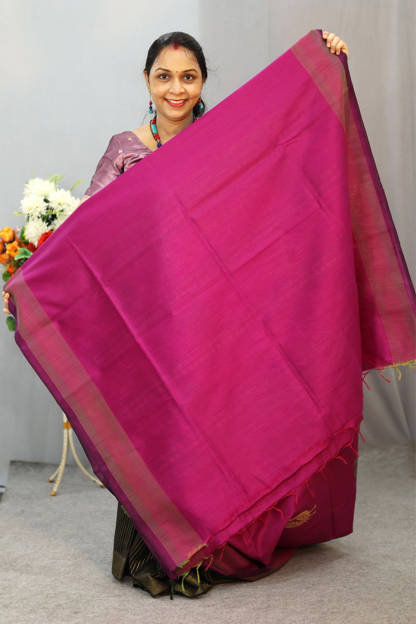 Handwoven Traditional artistry meets timeless beauty in this pink saree"