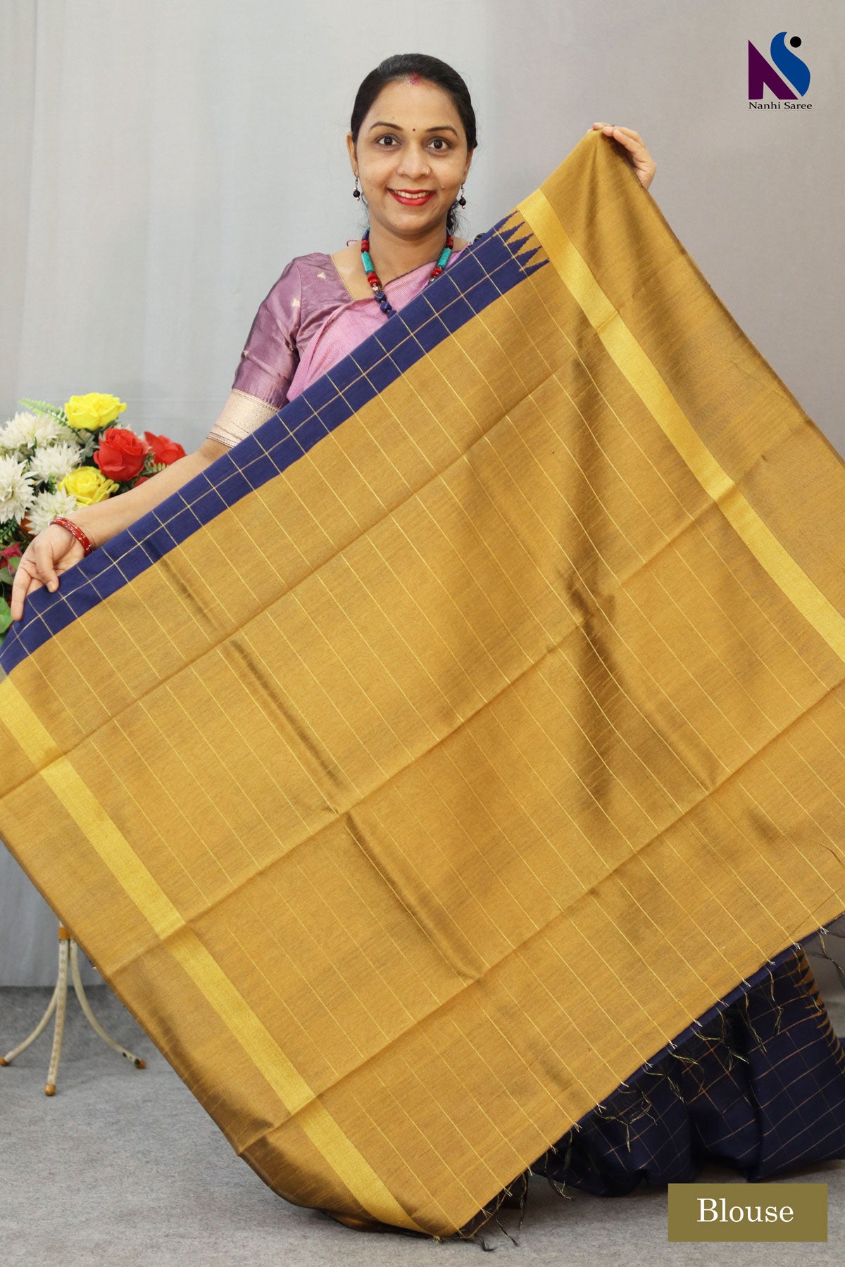 Classic golden and deep blue blend with timeless handwoven artistry saree