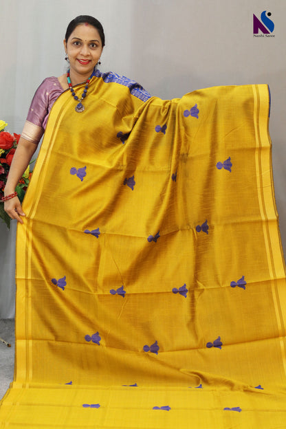 Vibrant yellow and blue tones paired with elegant handloom craftsmanship saree
