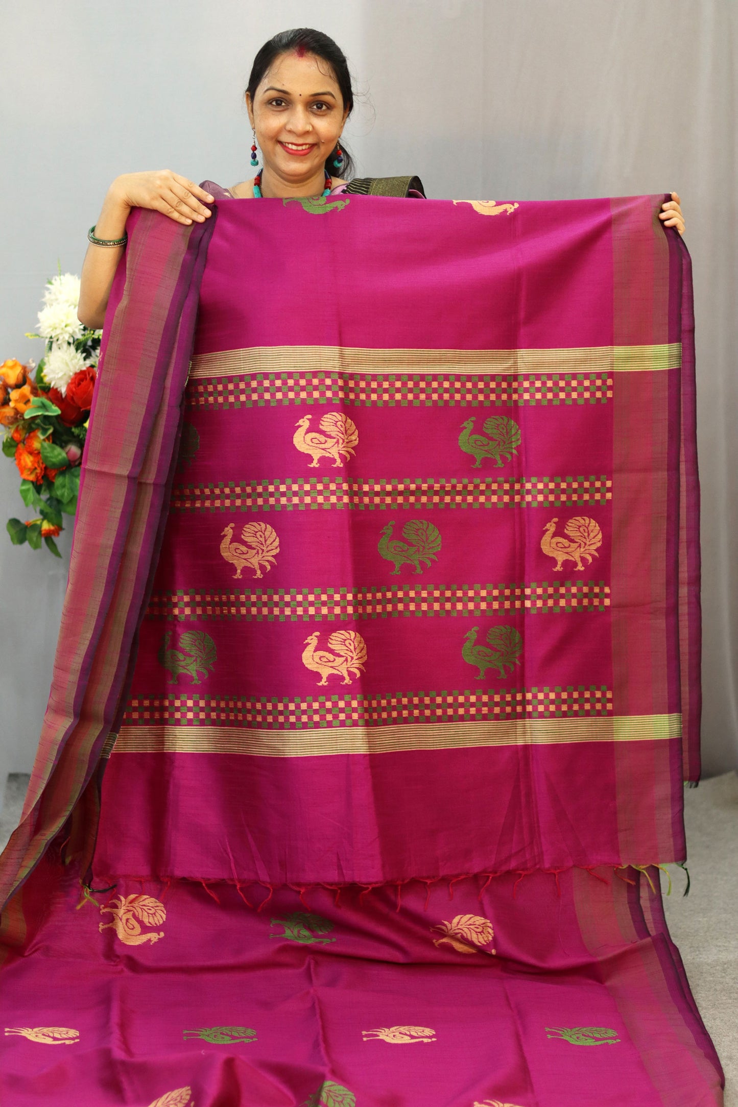 Handwoven Traditional artistry meets timeless beauty in this pink saree"