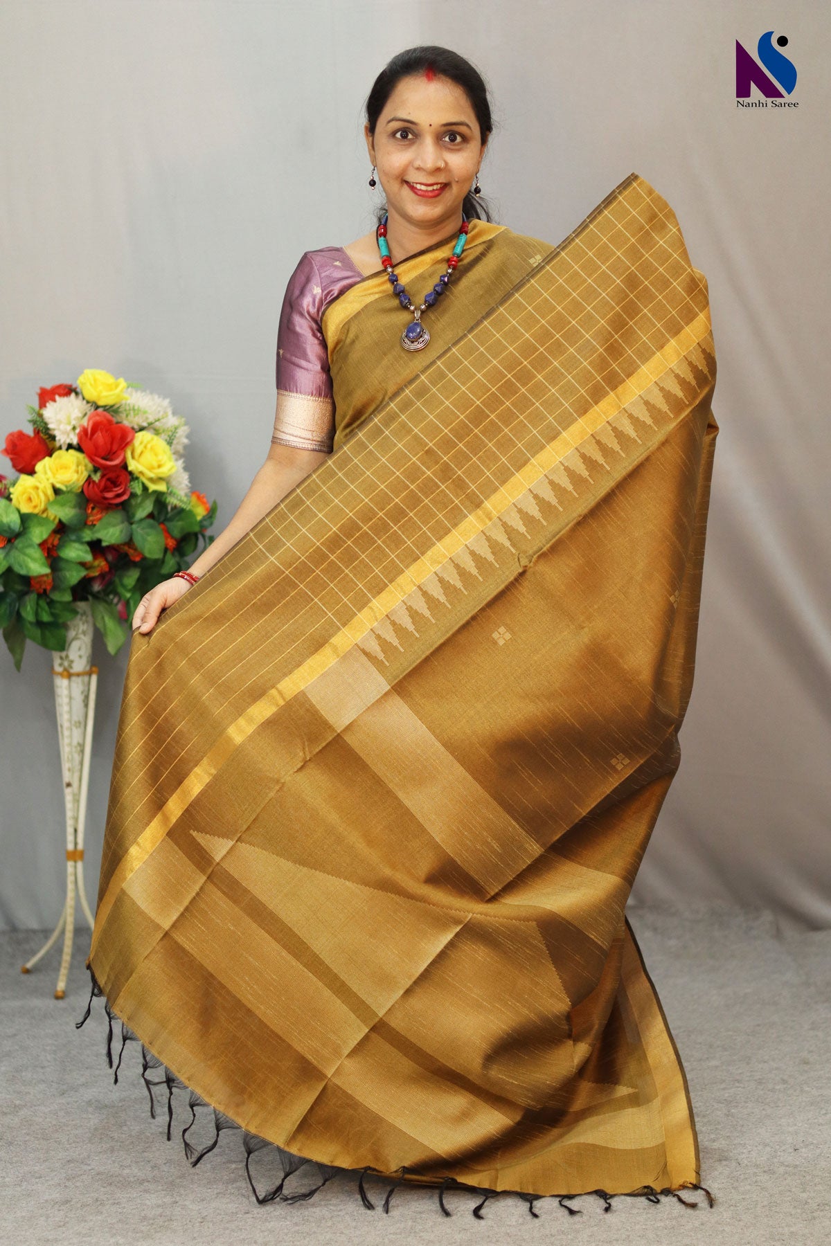 Warm mustard yellow color blended with timeless handloom artistry saree