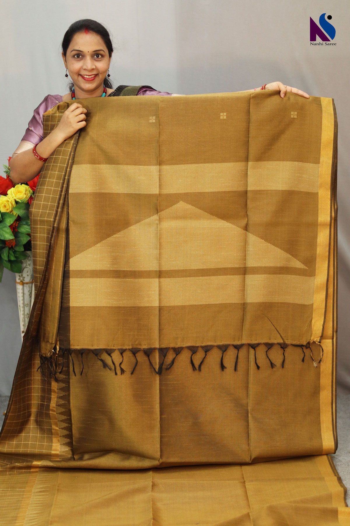 Warm mustard yellow color blended with timeless handloom artistry saree