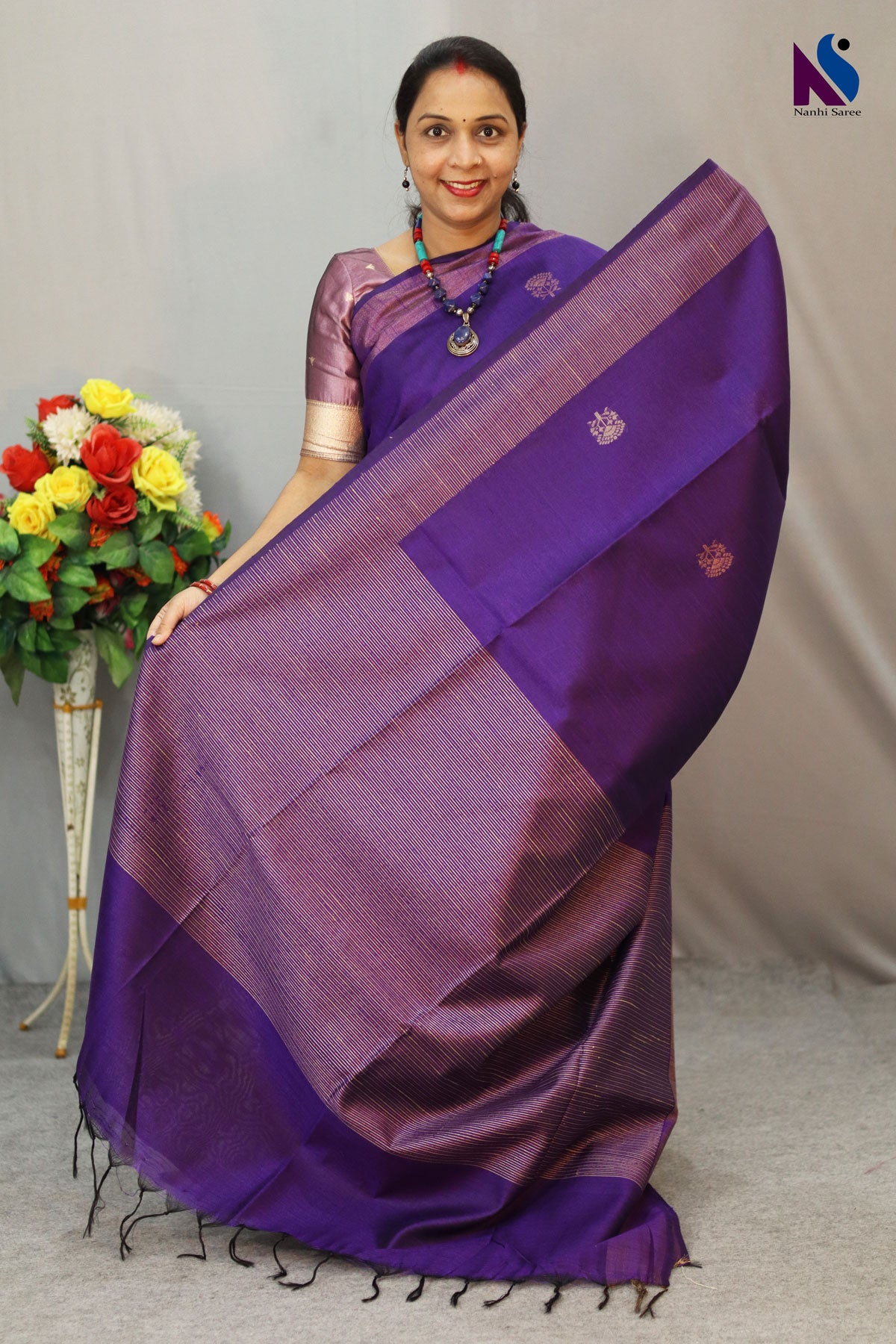 Elegant dark purple shade designed with fine traditional handloom weaving saree