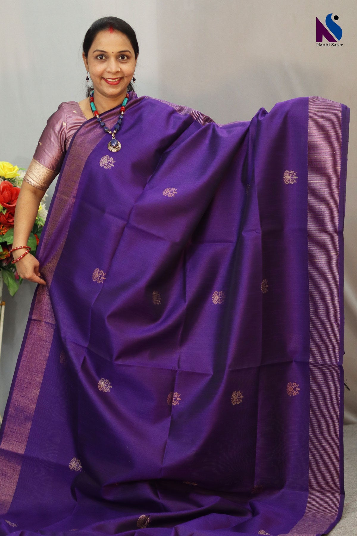 Elegant dark purple shade designed with fine traditional handloom weaving saree