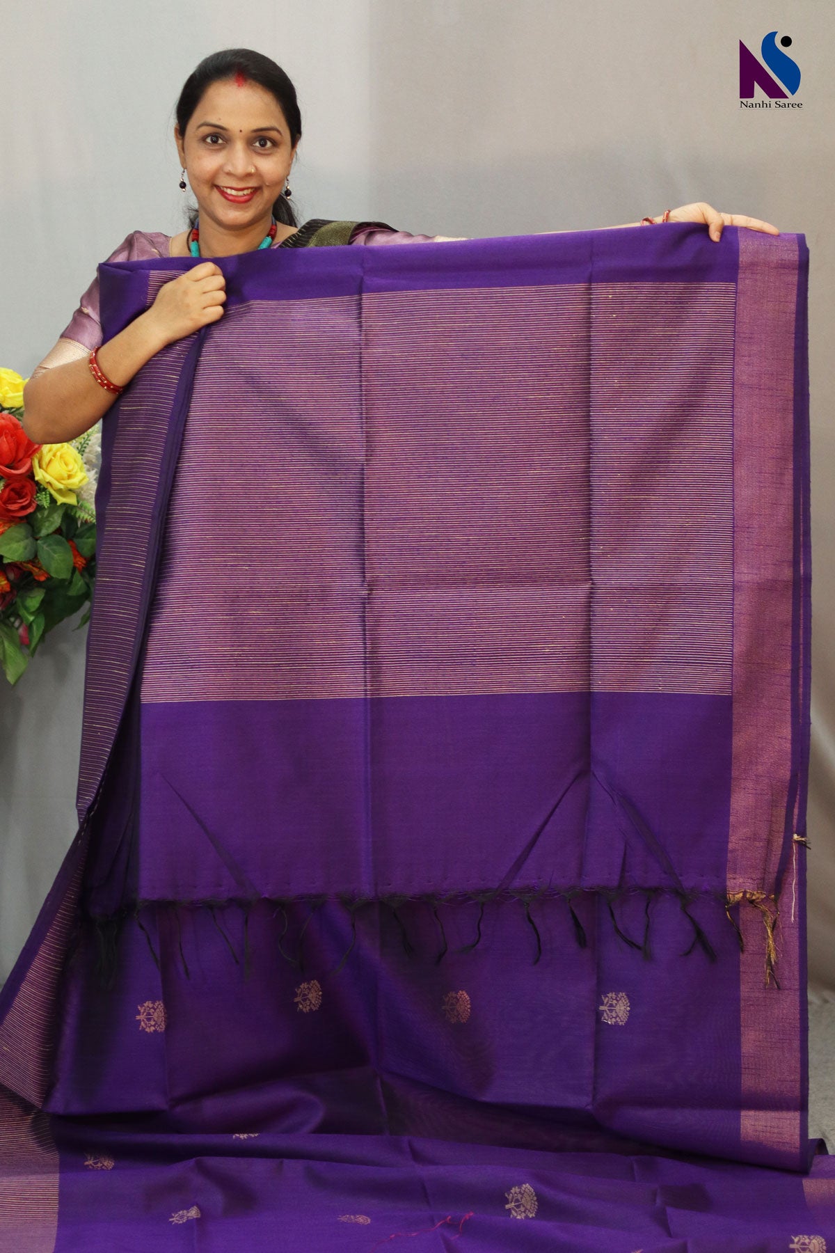 Elegant dark purple shade designed with fine traditional handloom weaving saree