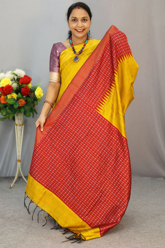 "Elegant yellow hand-woven saree, crafted with intricate artistry."