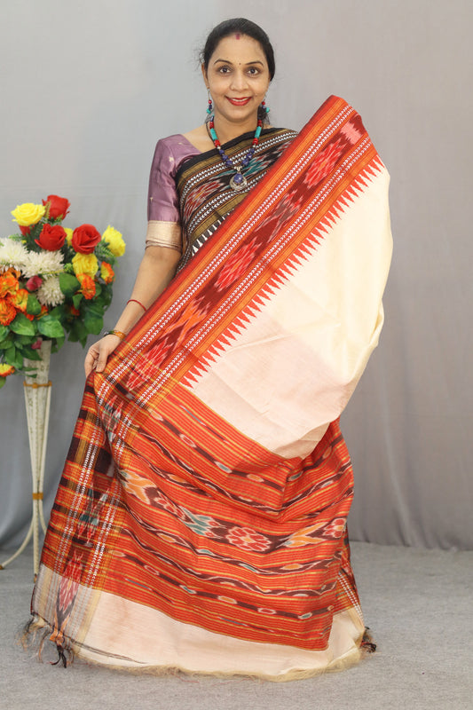 Handwoven Flema Silk Saree Featuring tussar colour Ikkat Border
