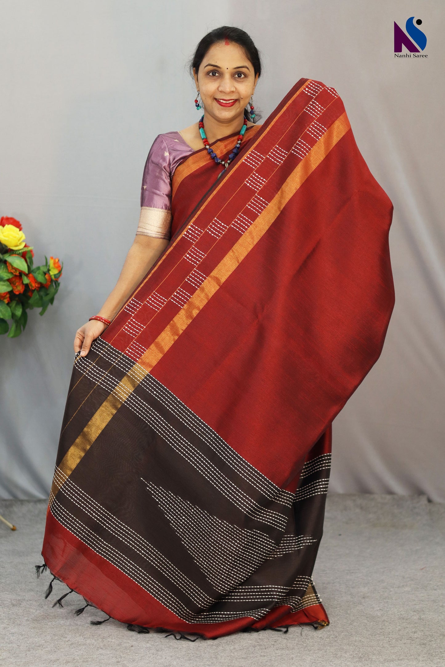 Beautifully designed wine red handloom saree for festive and special occasions