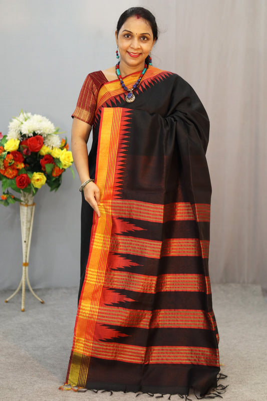 "Elegant black art silk saree with beautifully designed pallu."