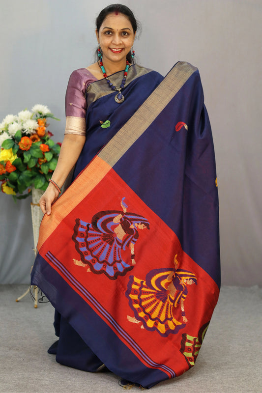 "Elegant navy blue hand-woven saree, crafted with intricate artistry."