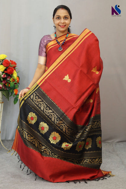 Elegant fusion of red and black with timeless handwoven artistry saree