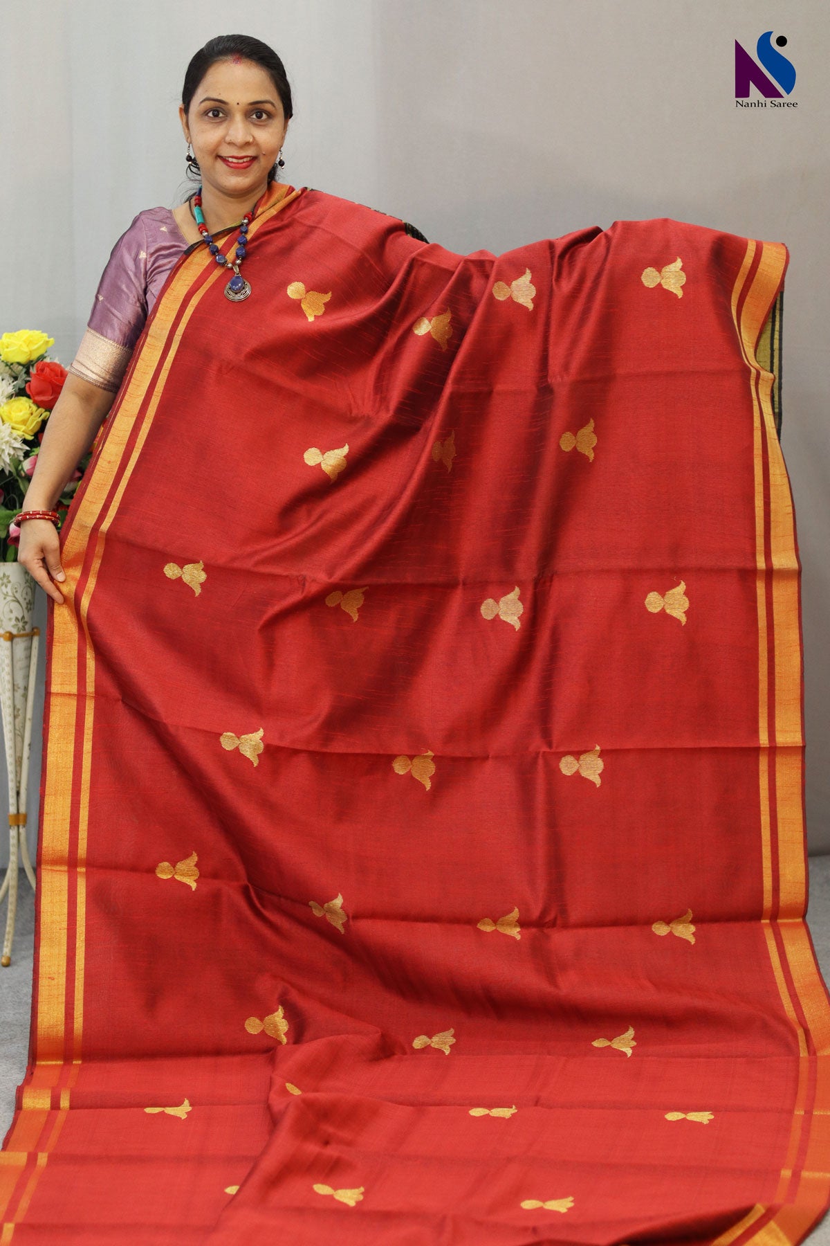Elegant fusion of red and black with timeless handwoven artistry saree