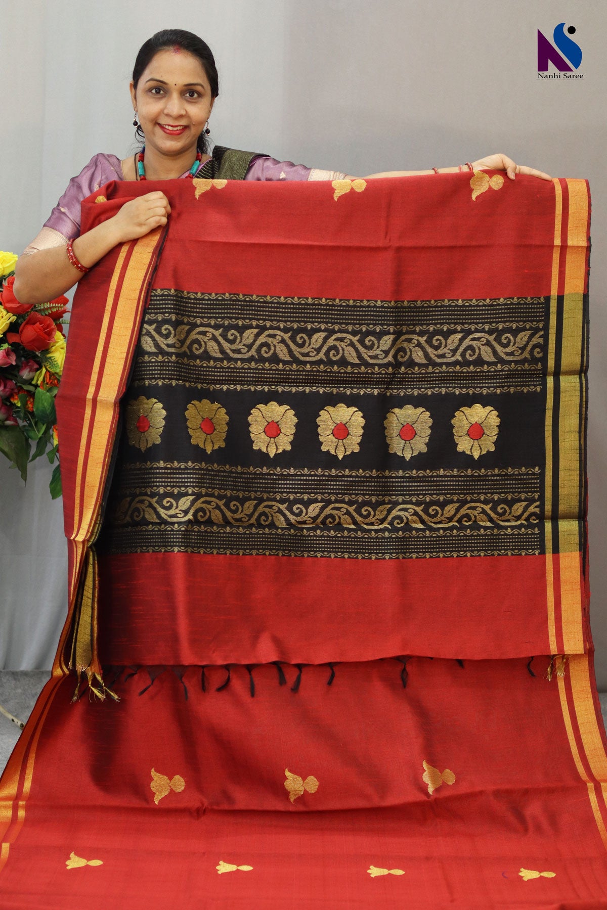 Elegant fusion of red and black with timeless handwoven artistry saree