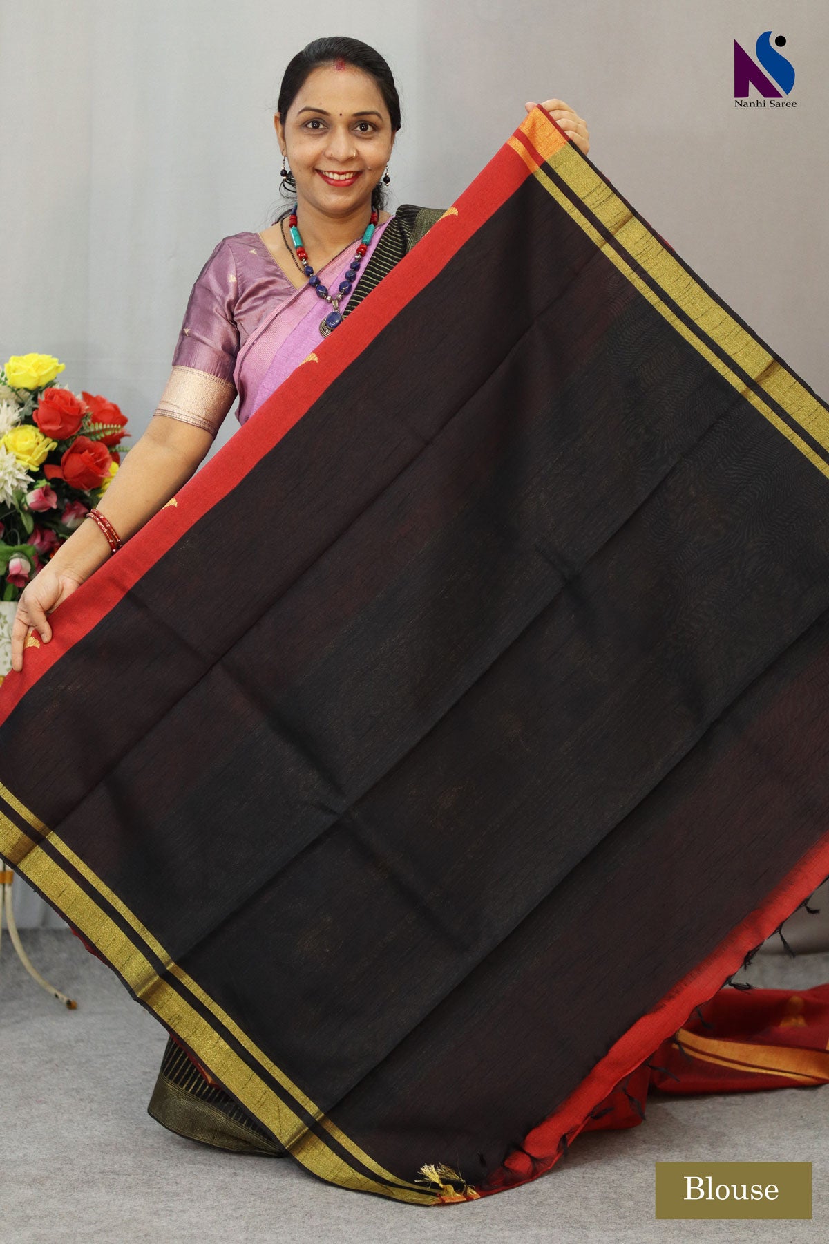 Elegant fusion of red and black with timeless handwoven artistry saree