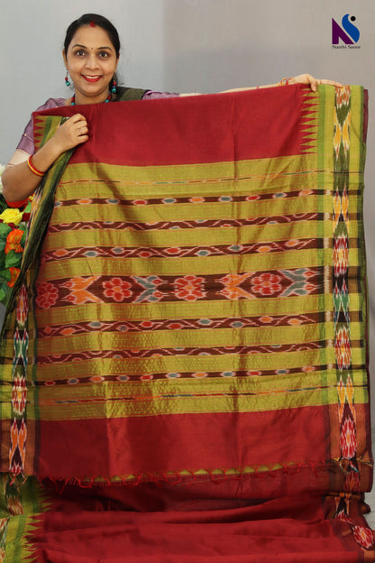 Traditional geometric patterns shine in this red Pochampally design handloom saree