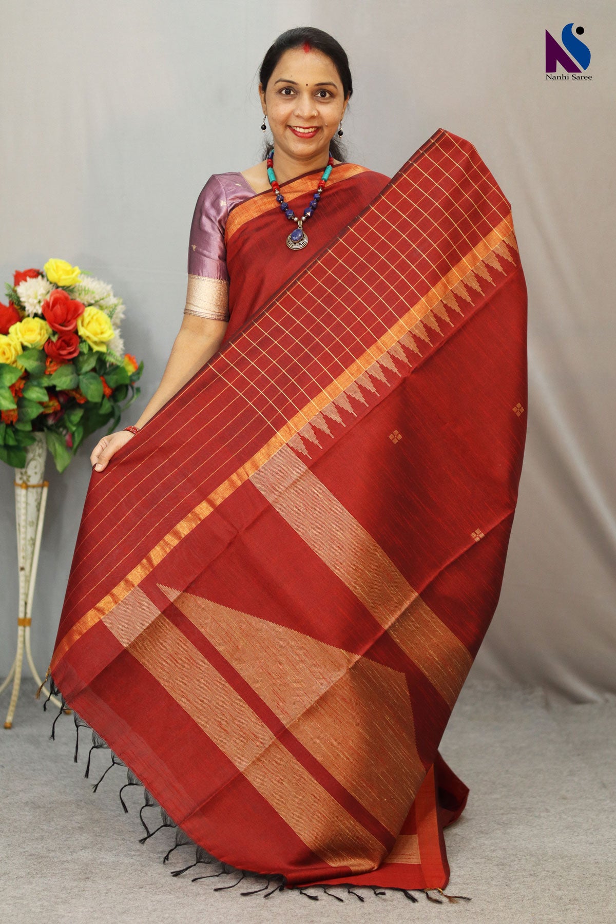 Striking wine red handloom weave that speaks of heritage and modern charm