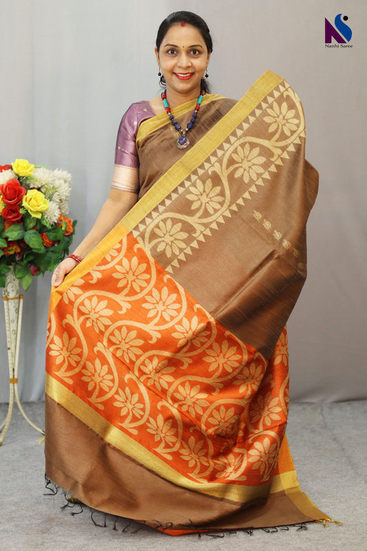 Subtle light brown tone enhanced with intricate handwoven detailing saree