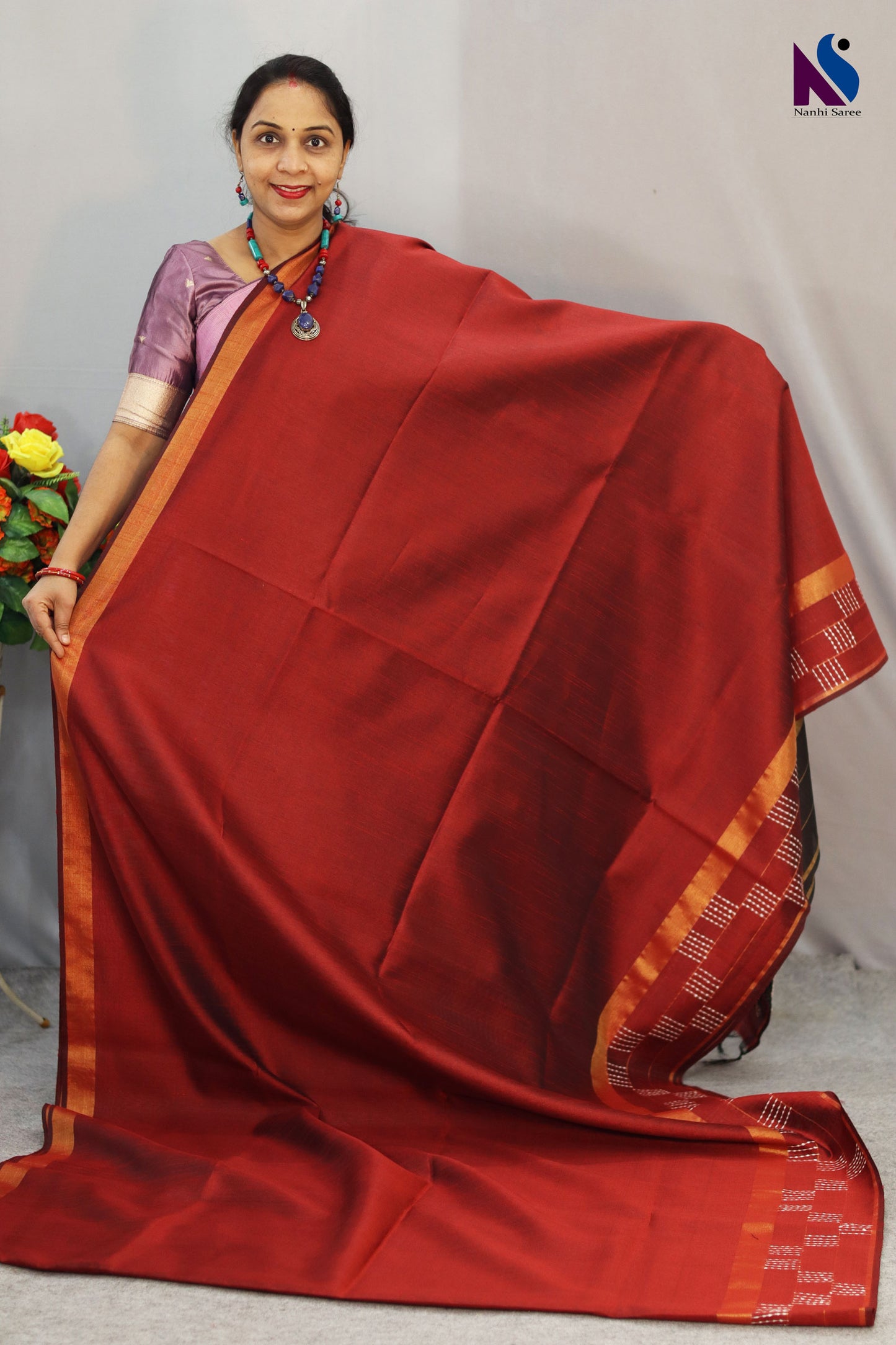 Beautifully designed wine red handloom saree for festive and special occasions