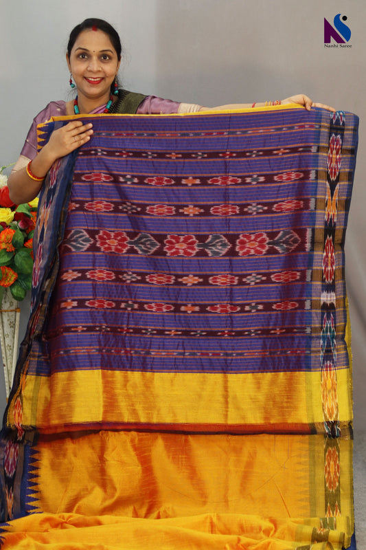 Rich yellow handloom saree highlighted with traditional Pochampally design