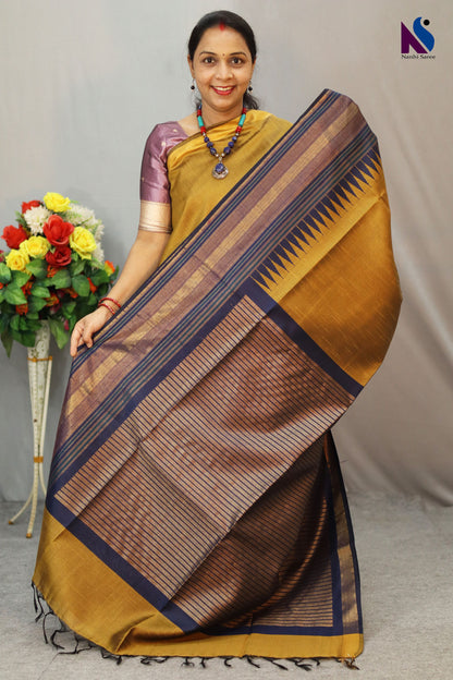 Earthy mustard tones woven in a graceful traditional handloom drape