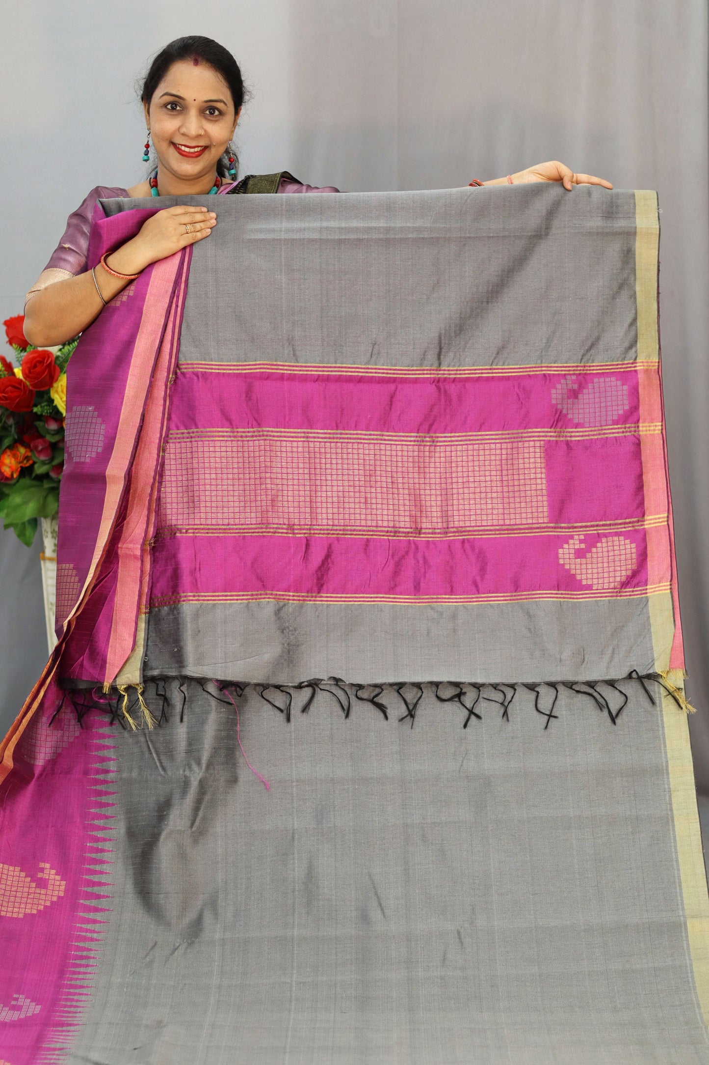 Handwoven gray art silk saree with soft yet striking pink pallu