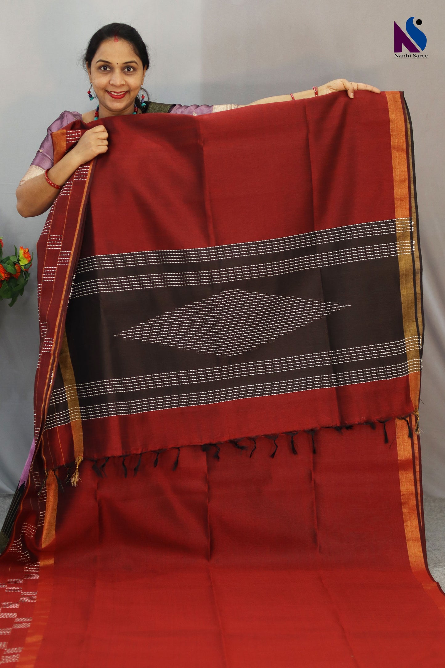 Beautifully designed wine red handloom saree for festive and special occasions