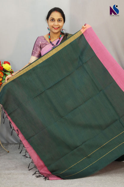 Soft light pink tones highlight the beautiful design of this handloom saree
