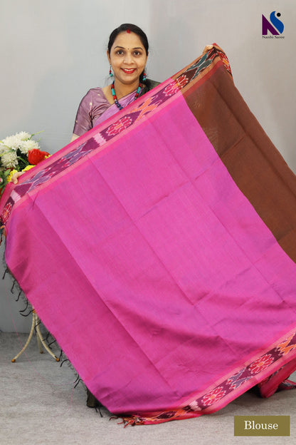 Warm brown hues blended with iconic Pochampally design handloom saree