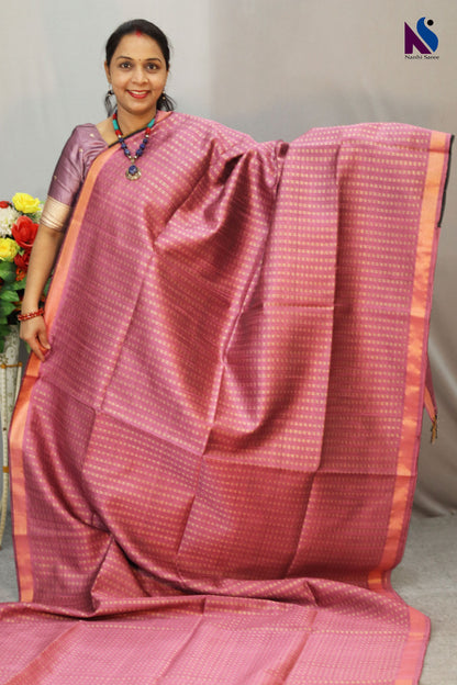 A charming English pink handloom creation designed for effortless elegance