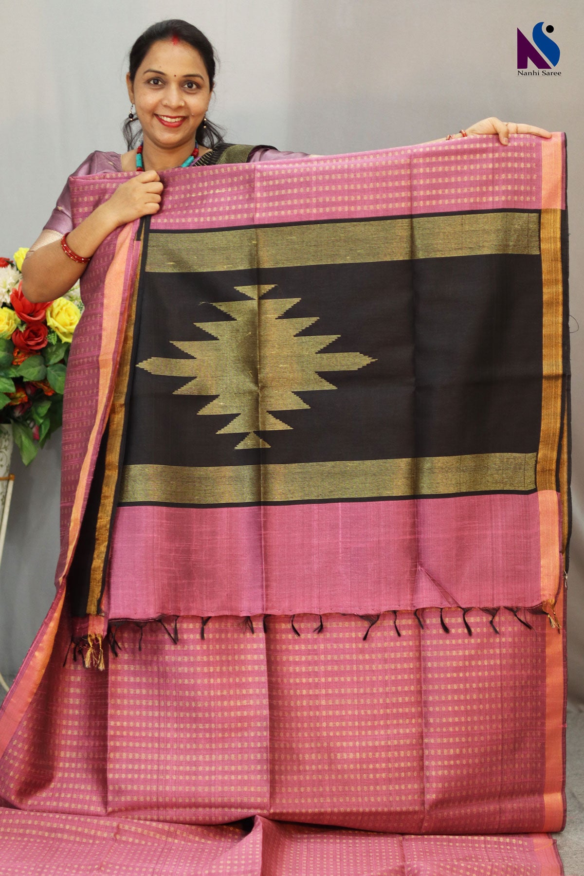 A charming English pink handloom creation designed for effortless elegance