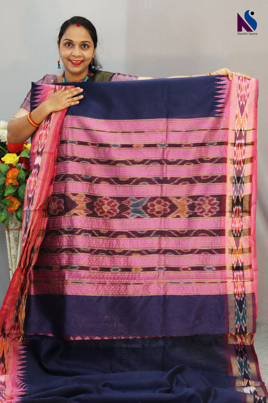 Navy blue hues highlight the intricate Pochampally patterns in this handloom saree