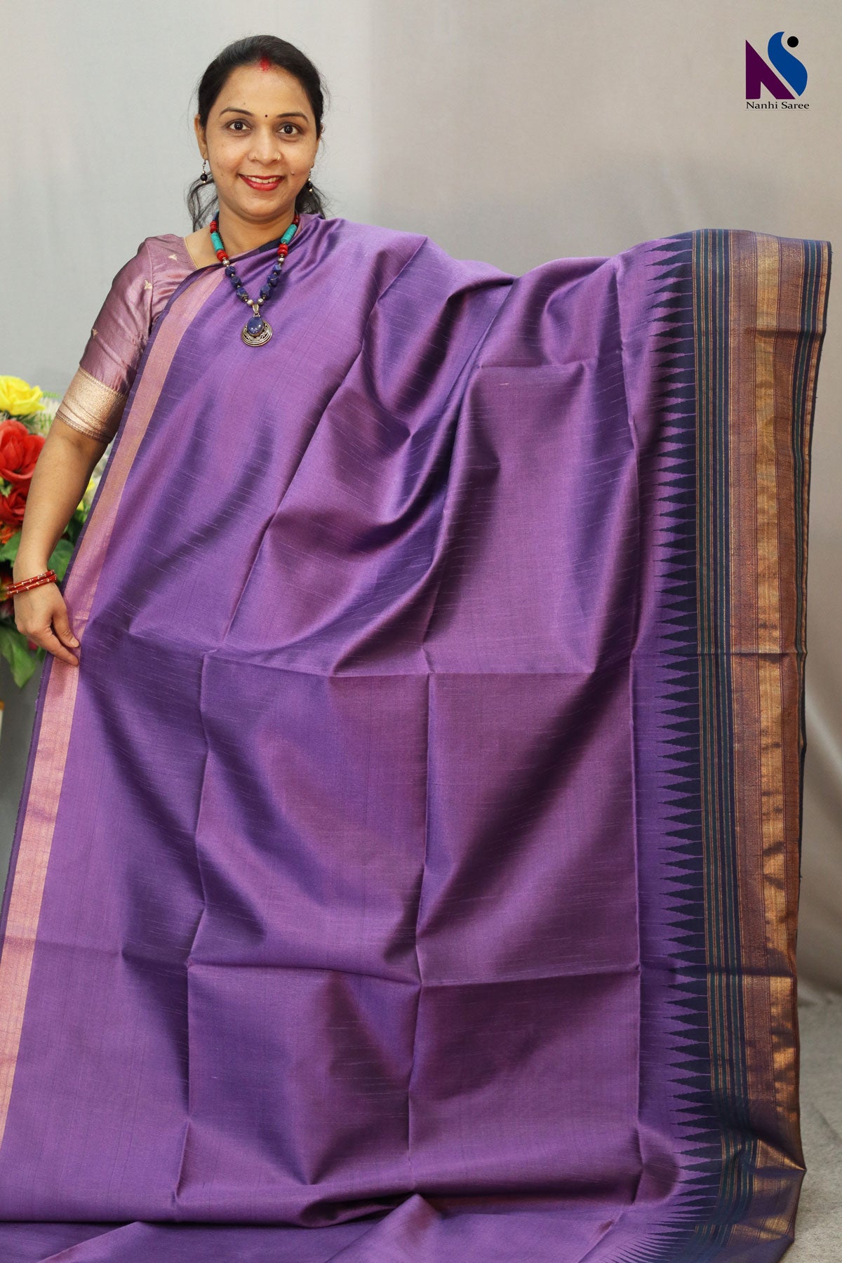 Regal purple handloom saree with a bold and elegant presence