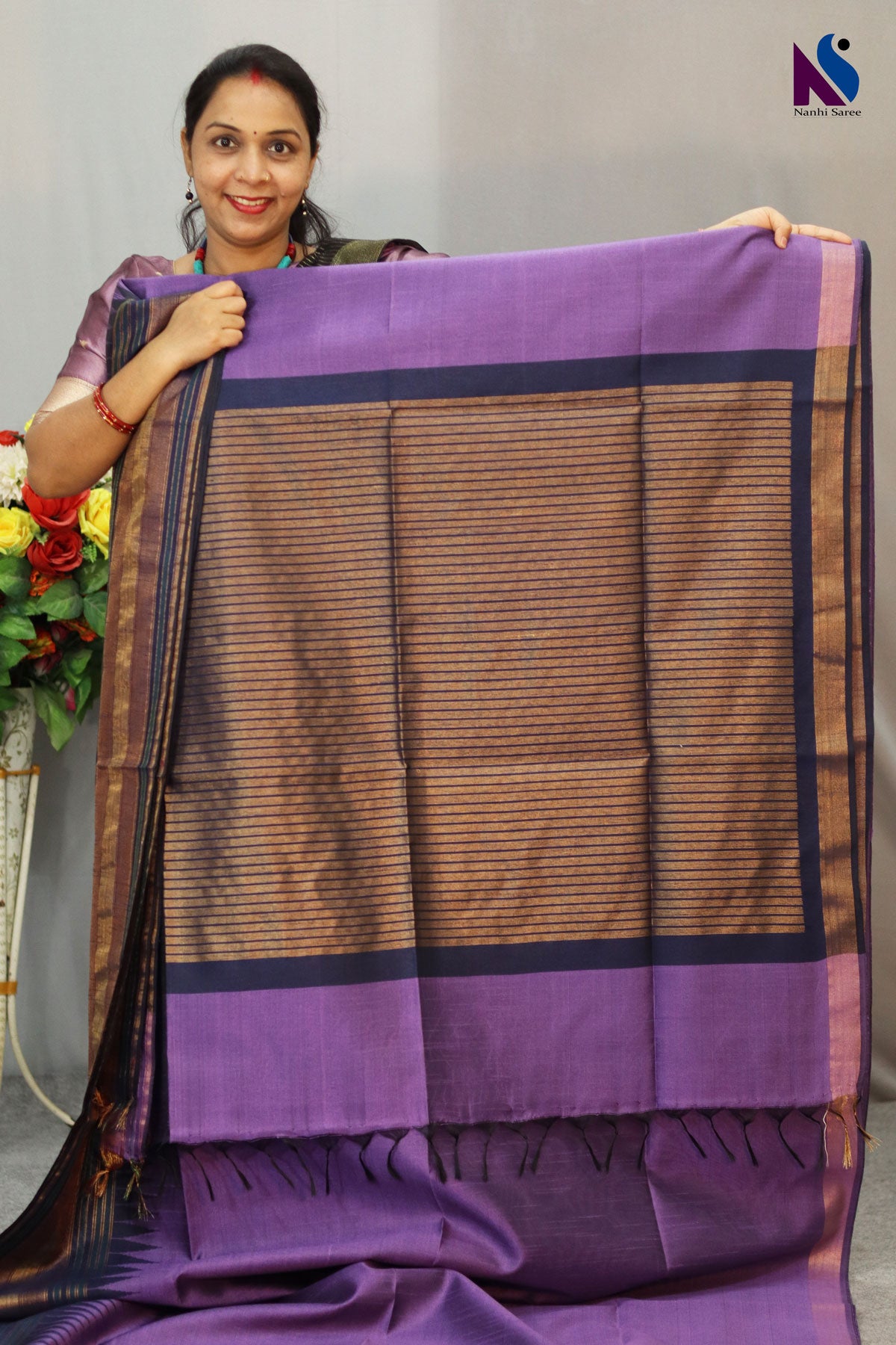 Regal purple handloom saree with a bold and elegant presence