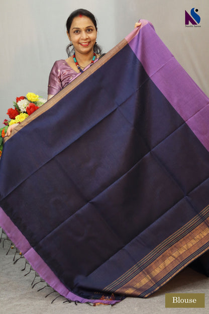 Regal purple handloom saree with a bold and elegant presence