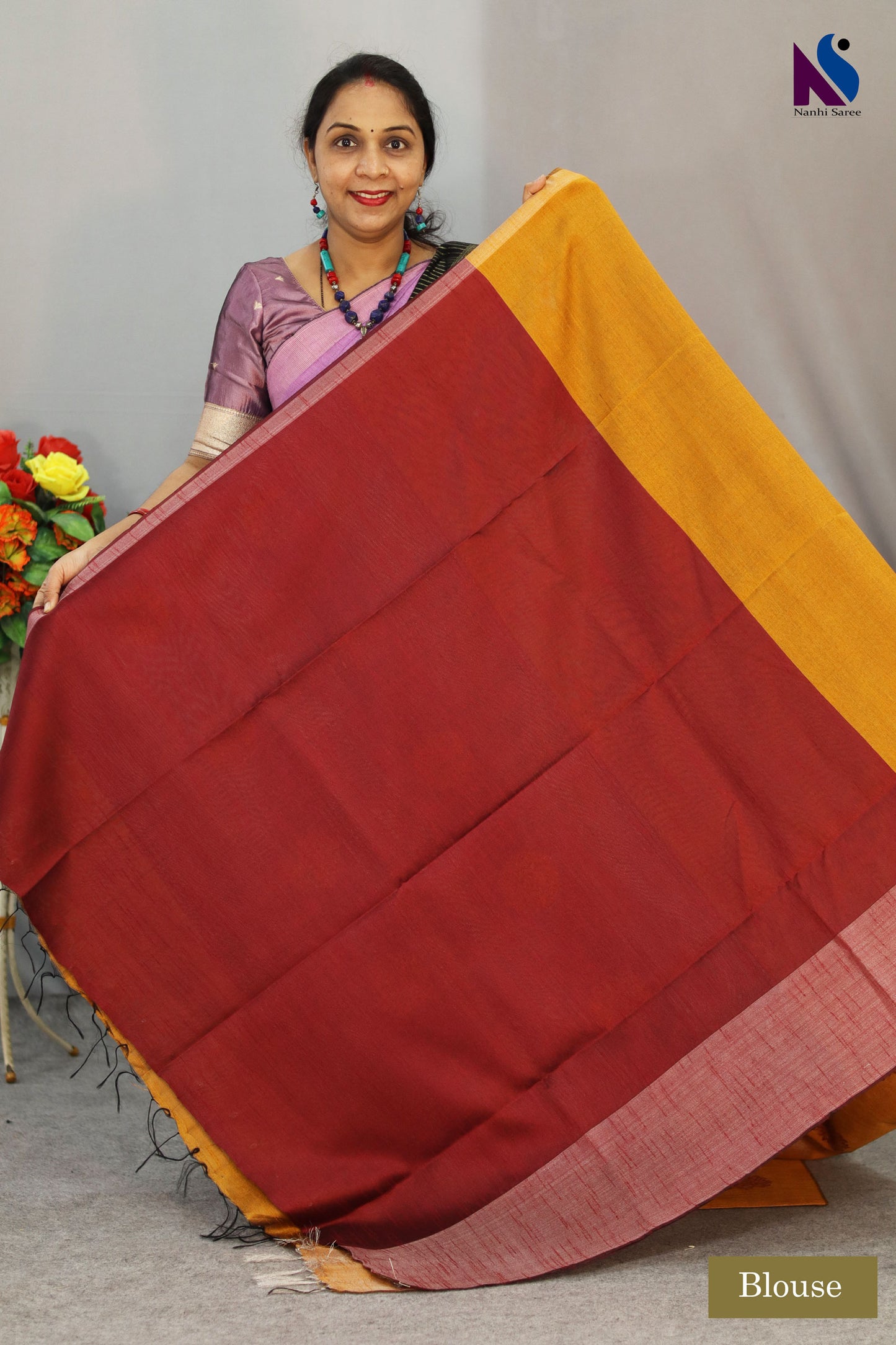 Bright turmeric yellow handloom saree showcasing elegant craftsmanship