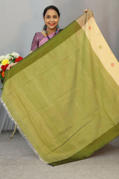 Elegant tussar colour and light mehendi art silk saree featuring classic contrast look