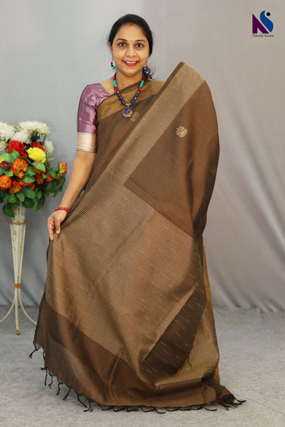 Graceful light brown handloom saree with soft traditional weave