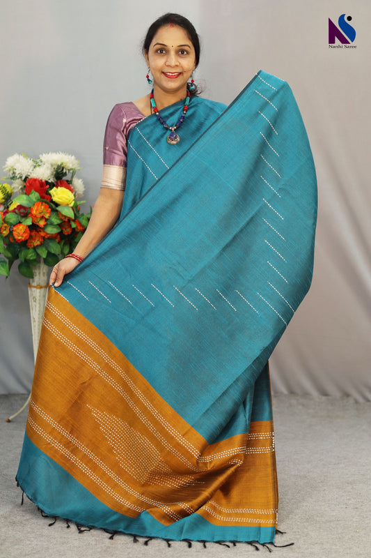 Elegant turquoise color handloom saree with graceful classic appeal