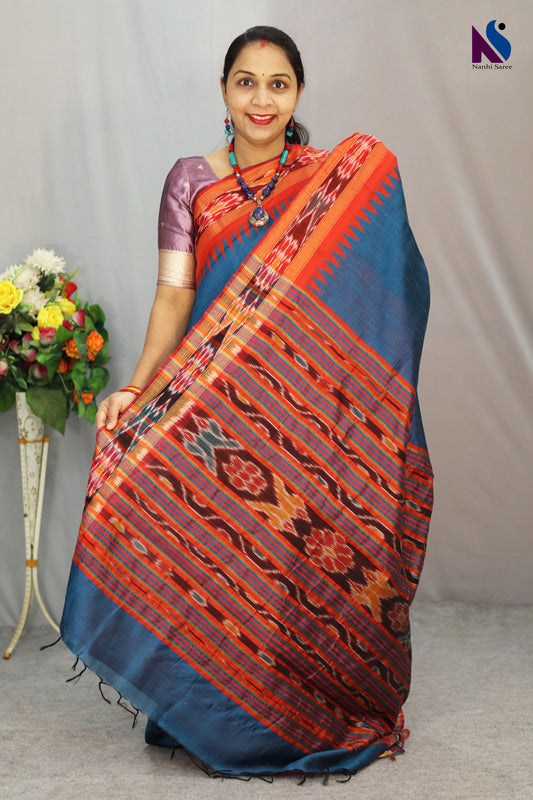 Rich royal blue tones enhance the elegance of this handloom saree