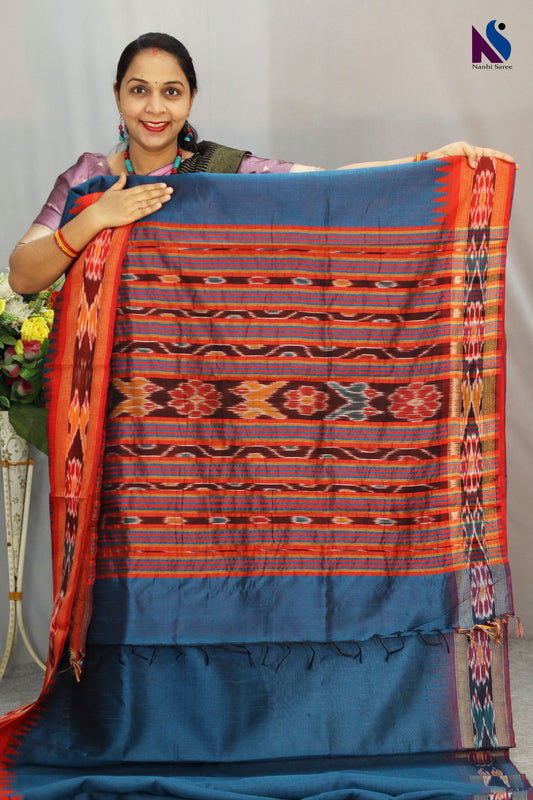 Rich royal blue tones enhance the elegance of this handloom saree