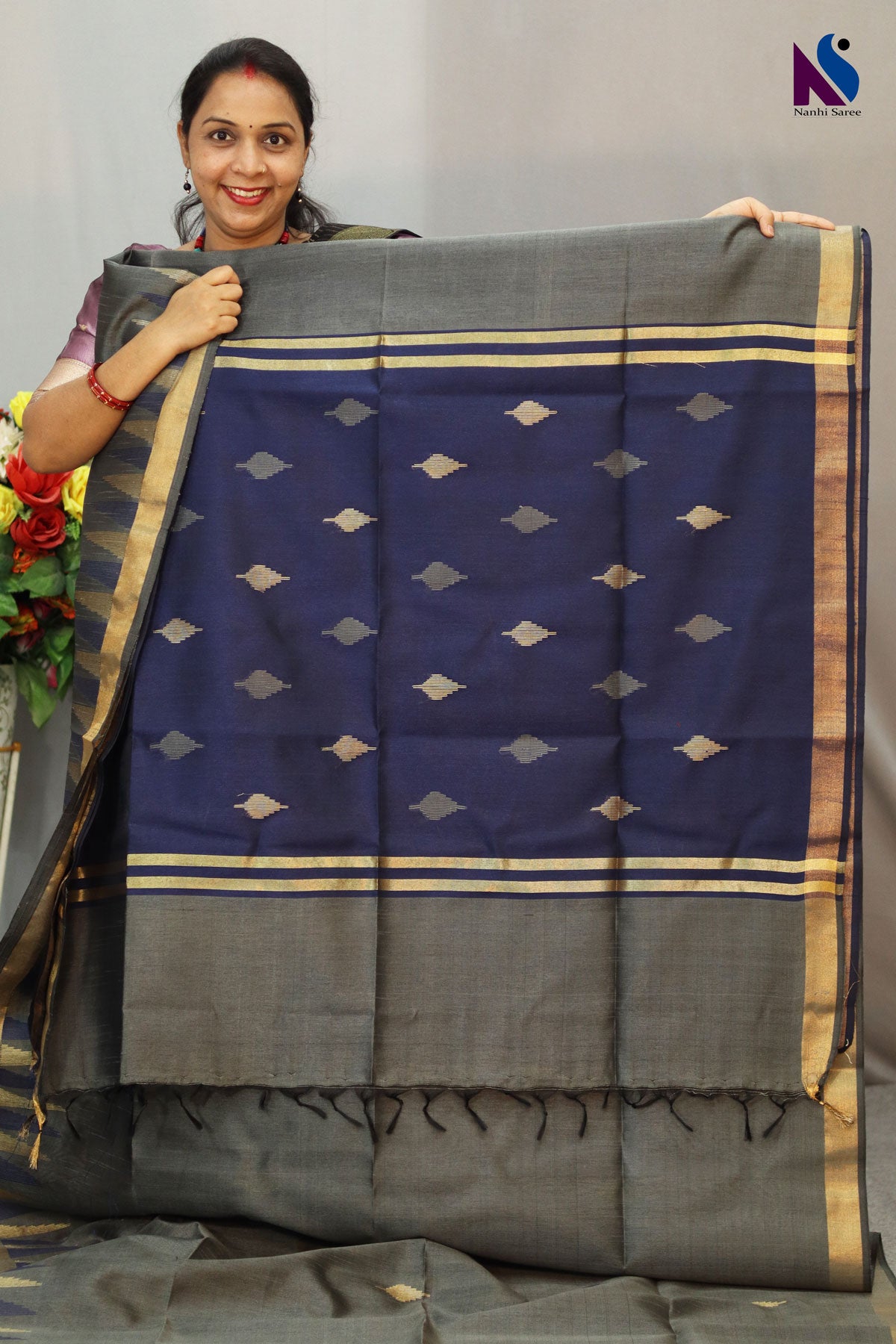 Smoky dark grey hue crafted in a finely detailed handloom weave