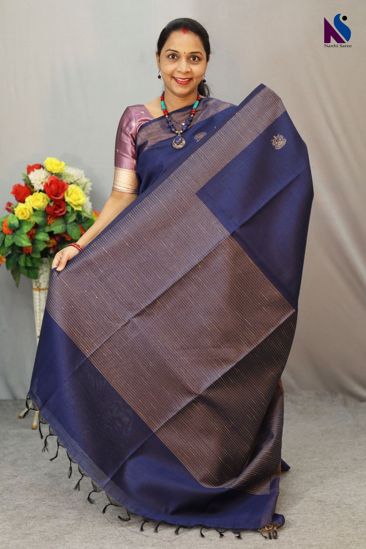 Rich navy blue color blended with timeless handloom artistry saree