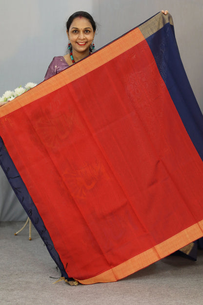"Elegant navy blue hand-woven saree, crafted with intricate artistry."