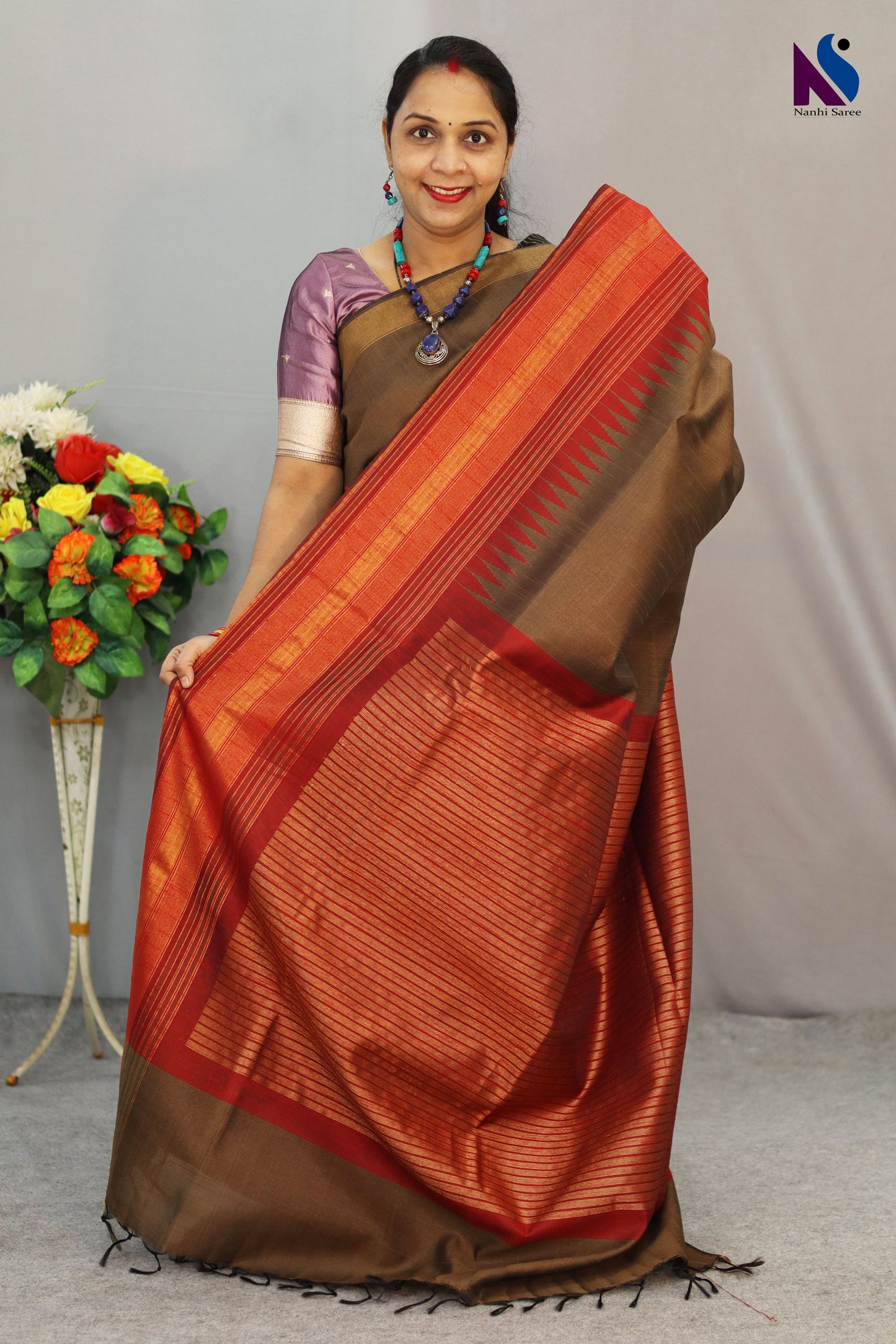 Soft earthy tones and gentle weave define this light brown handloom saree
