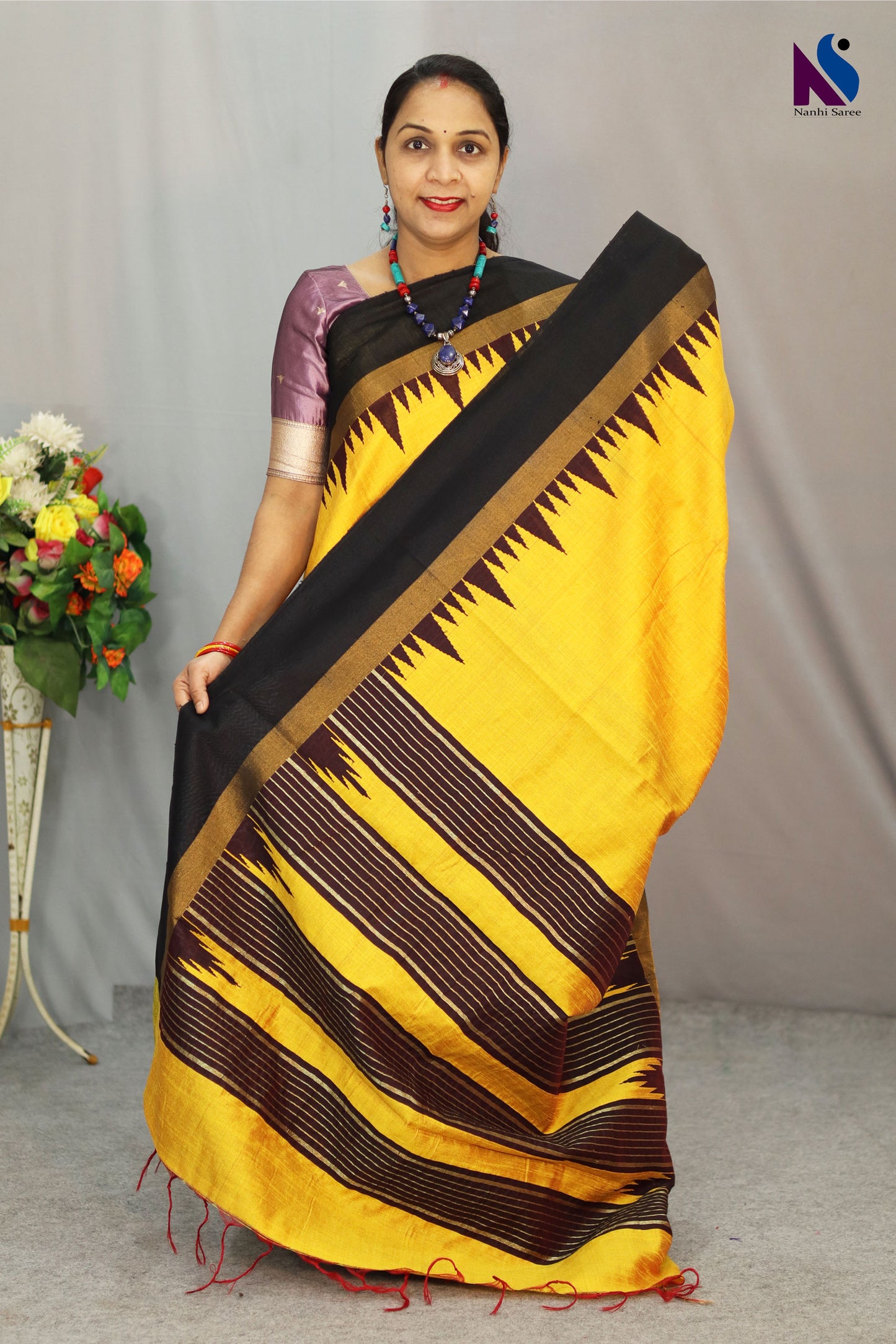 Soft light yellow handloom saree perfect for daytime elegance