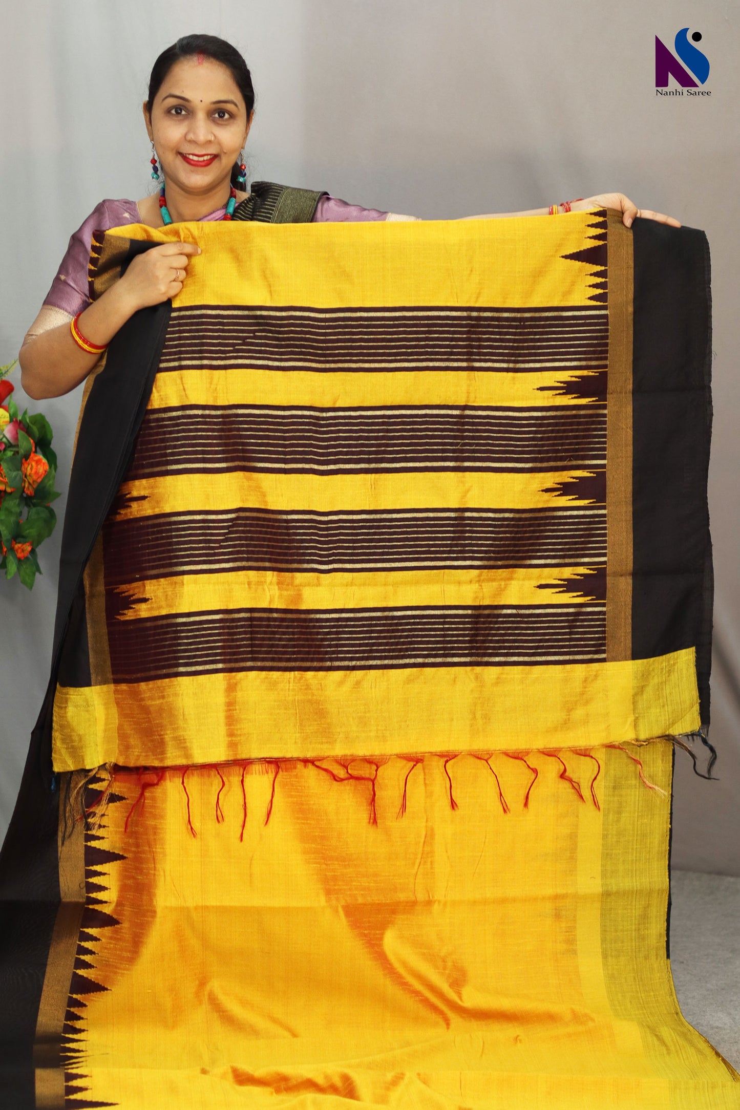 Soft light yellow handloom saree perfect for daytime elegance
