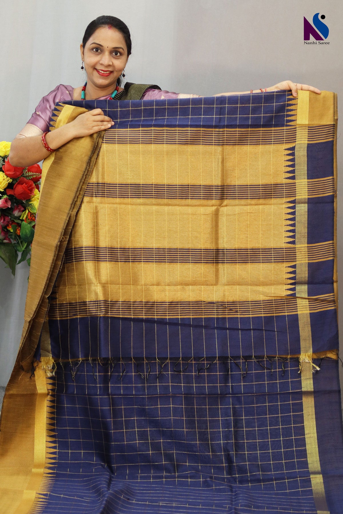 Classic golden and deep blue blend with timeless handwoven artistry saree