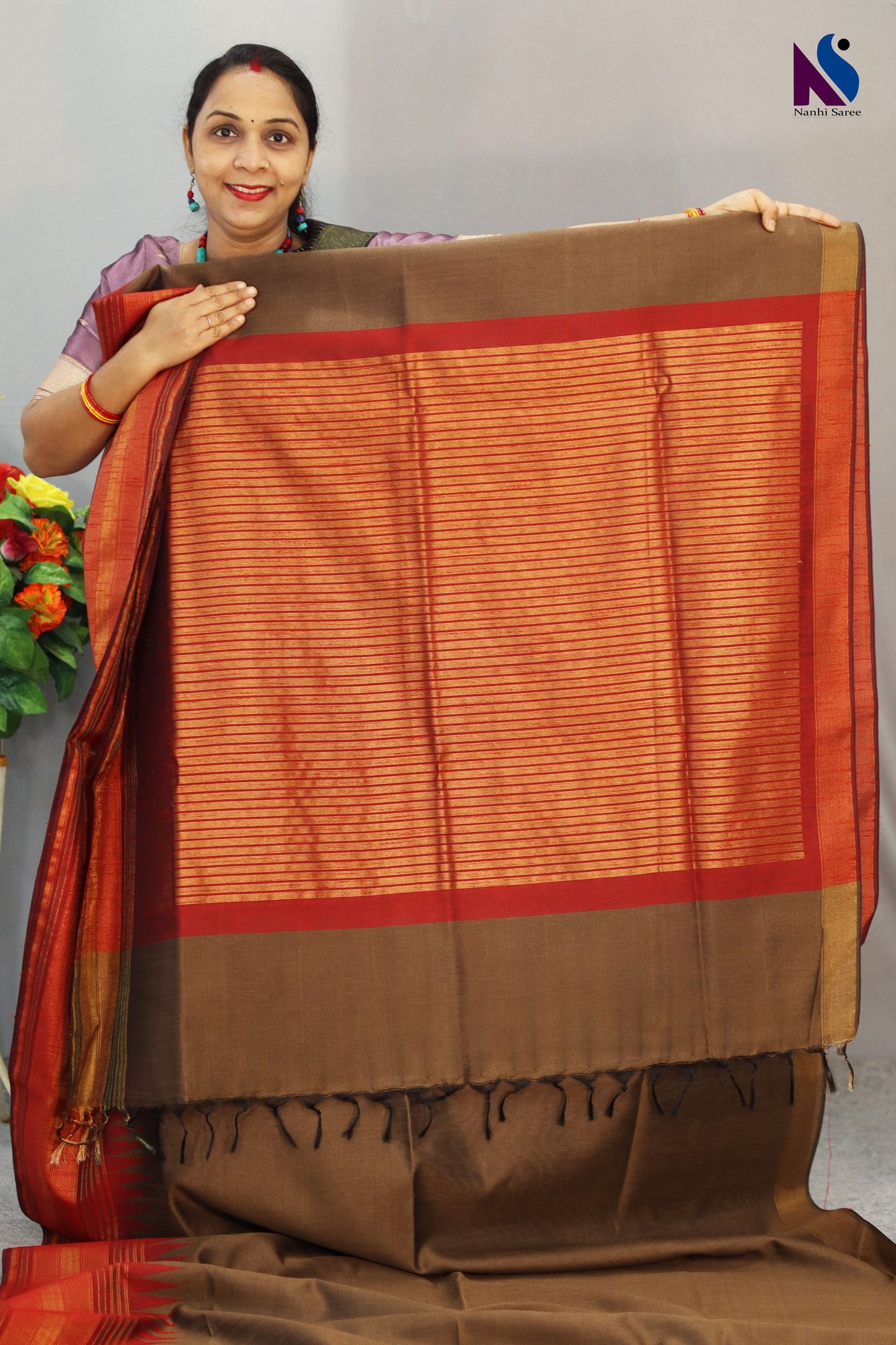 Soft earthy tones and gentle weave define this light brown handloom saree